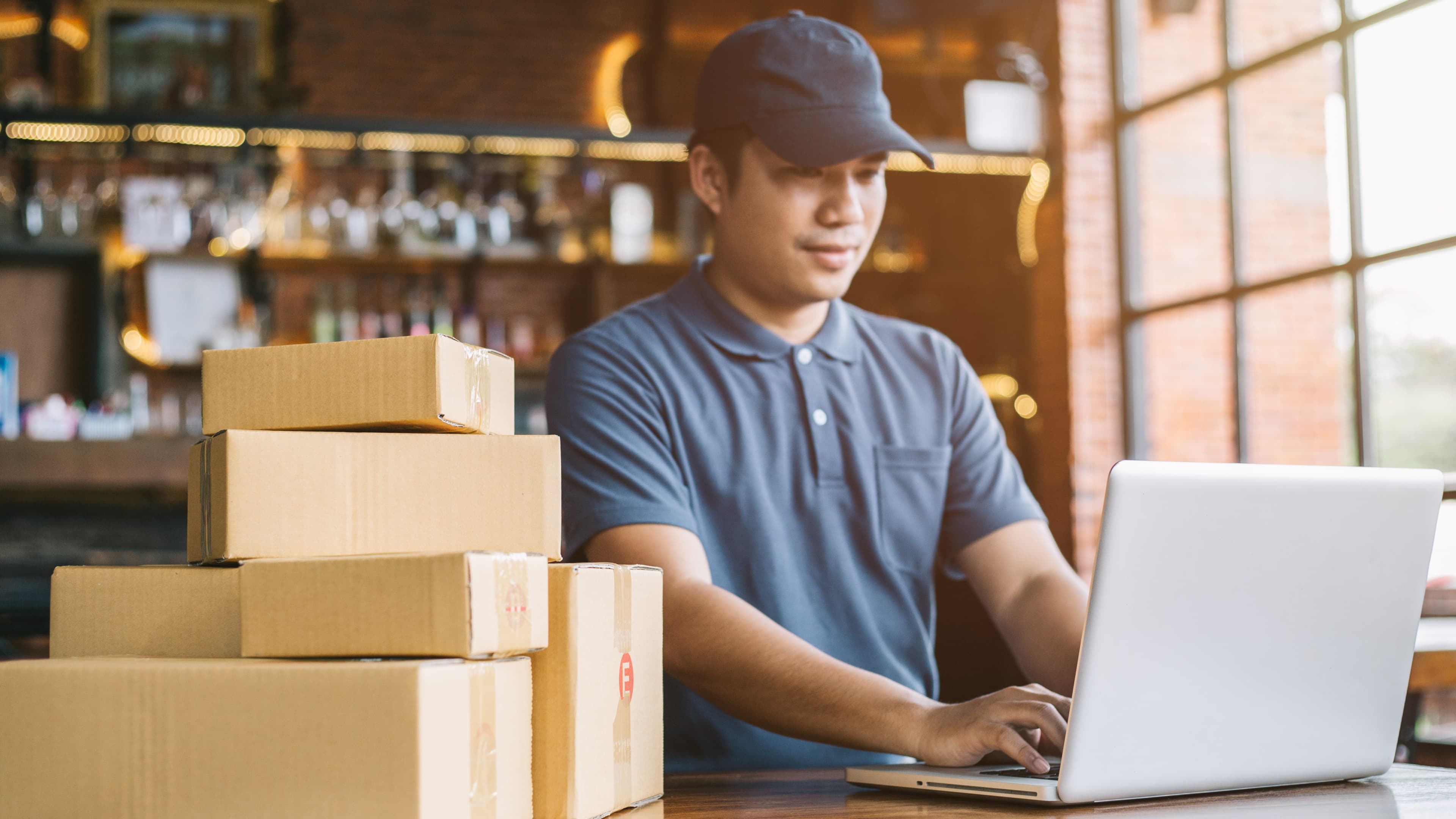 Image: Retailer On Computer